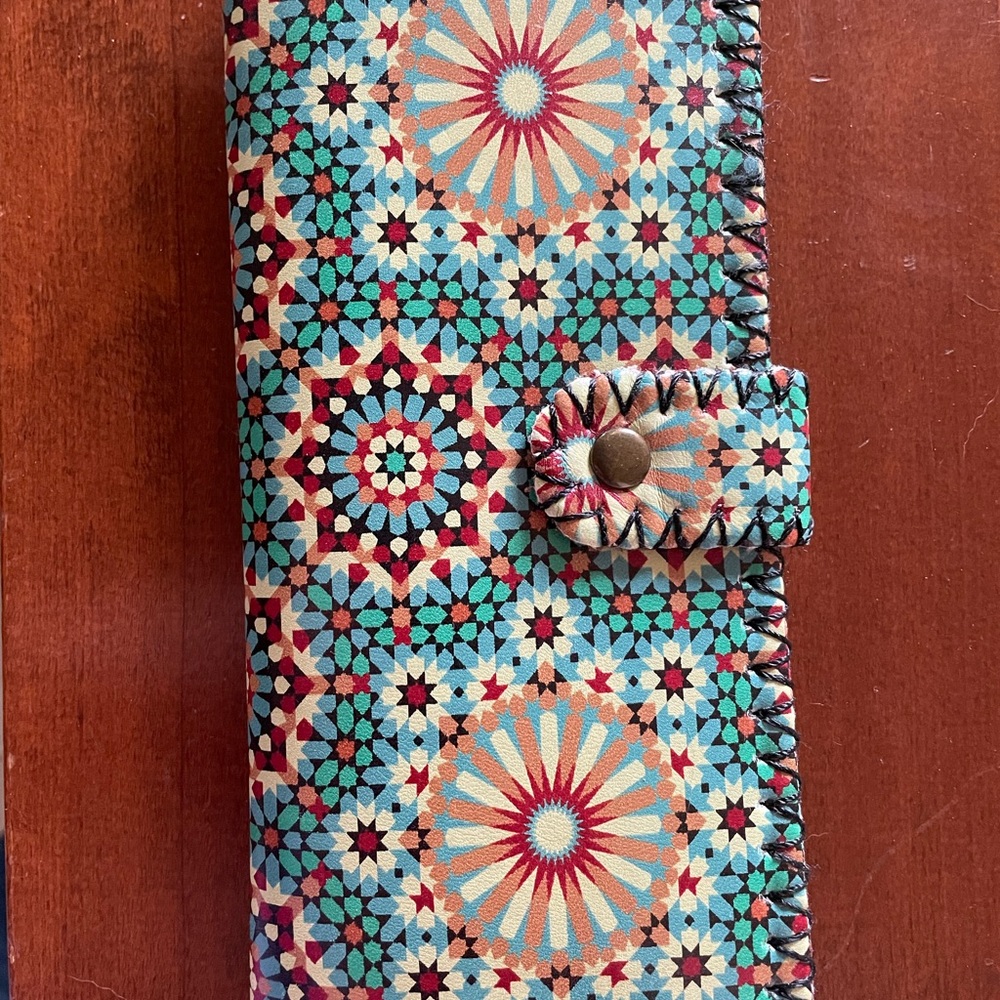 NWT. Spanish inspired wallet. Does have zippered coin slot.
